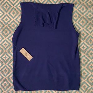 Never worn sleeveless turtleneck sweater.